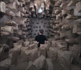 317 Prepared dc-motors, papers bags, shipping container, installation, Zimoun